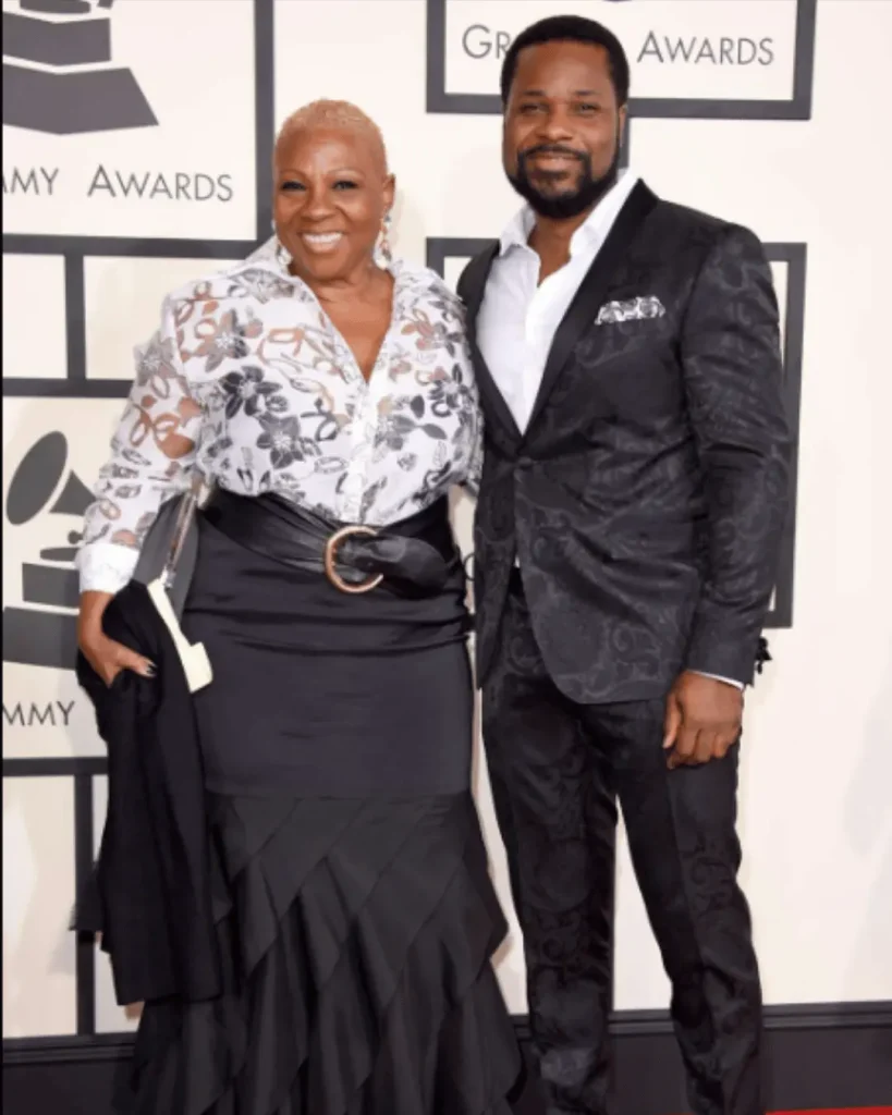 Malcolm-Jamal Warner standing with his mother Pamela Warner at the 2015 Grammy Awards