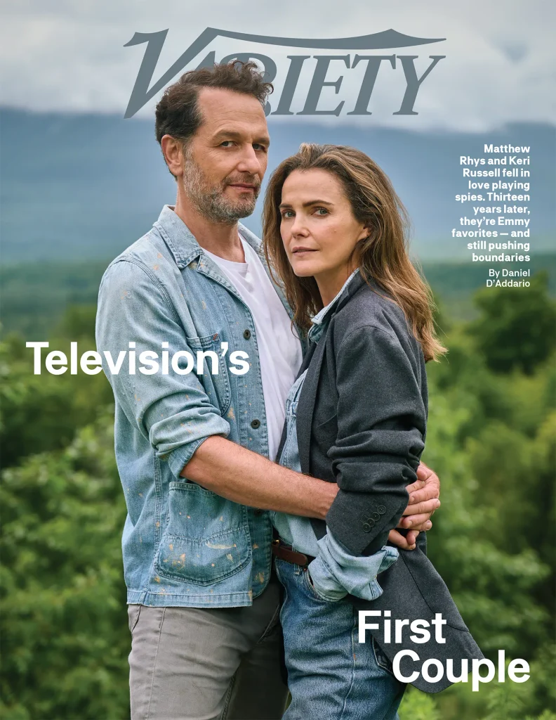Keri Russell and Matthew Rhys pose together outdoors on the cover of Variety, with Rhys wearing a denim jacket and Russell wearing a dark blazer.