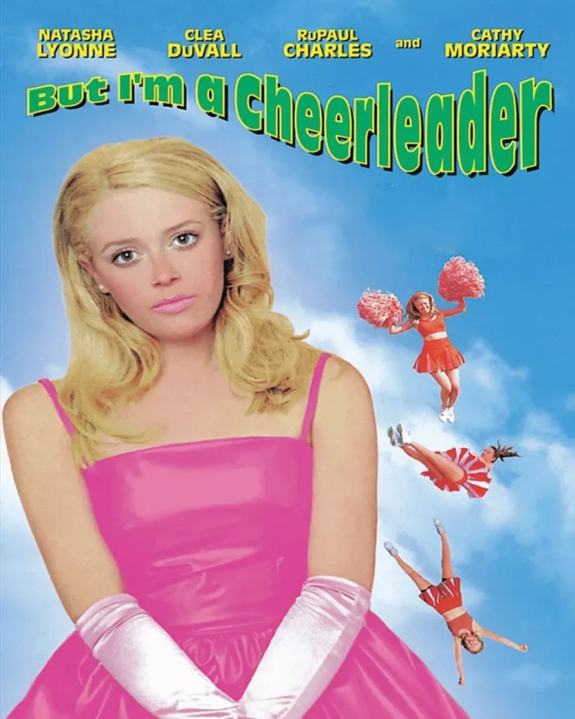But I’m a Cheerleader poster featuring Natasha Lyonne in a pink outfit with cheerleaders in the background.
