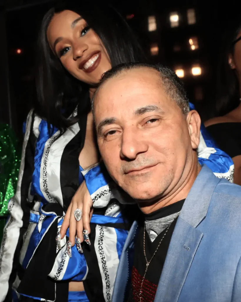 Carlos Almánzar with his daughter Cardi B at an event