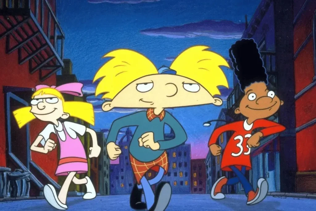 Arnold, Helga and Gerald walking together in a Hey Arnold scene.