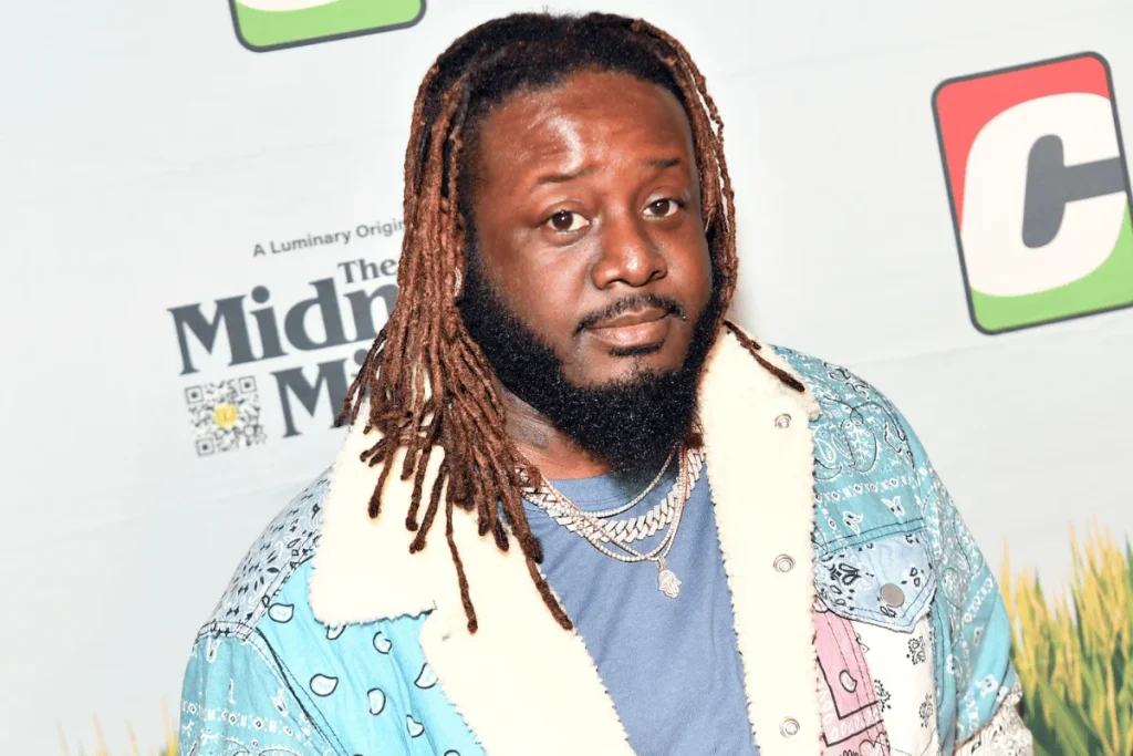T-Pain at a red carpet event showcasing his successful music career and entertainment journey