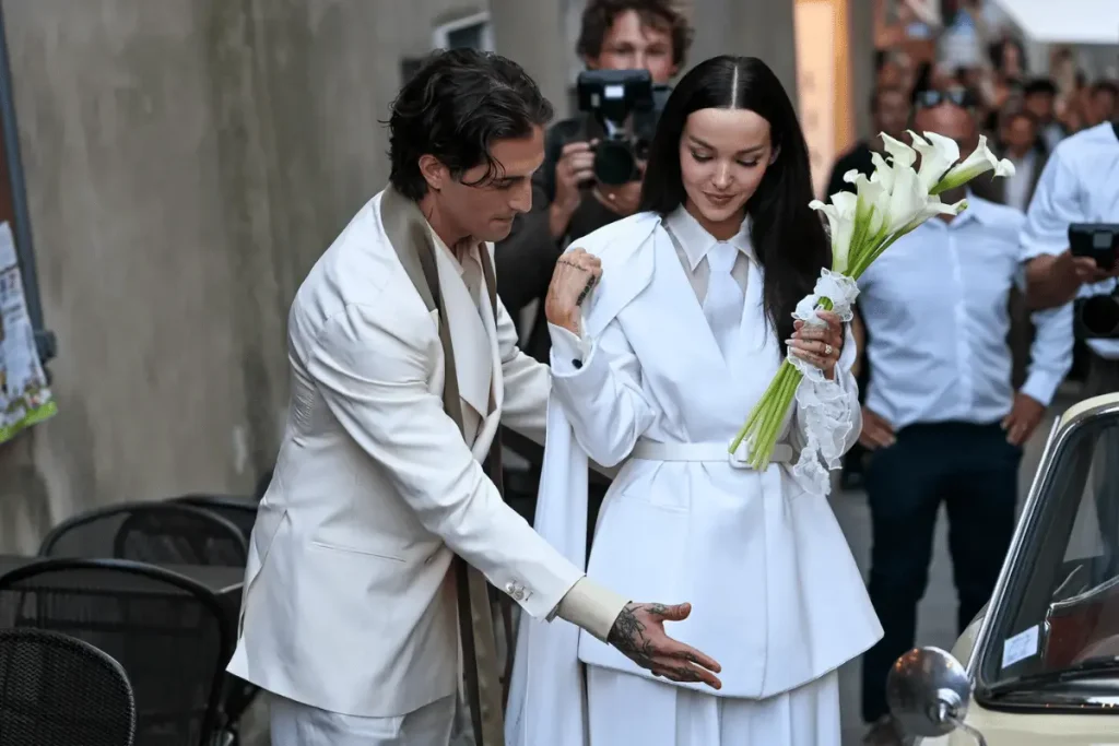 Dove Cameron and Damiano David arriving together at their wedding ceremony in Montalcino, Italy