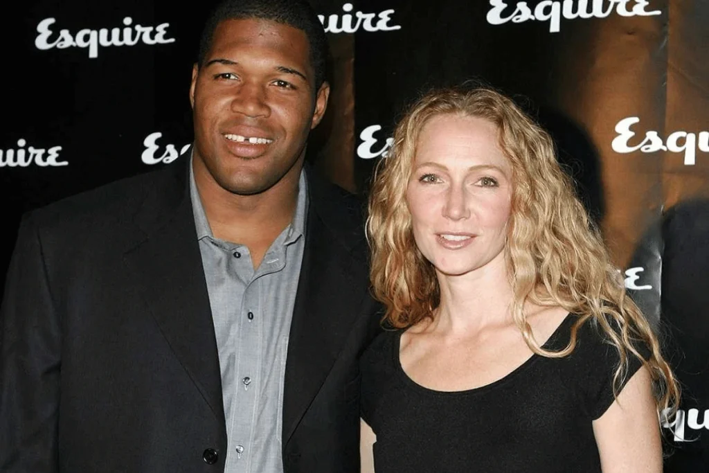 Michael Strahan and former wife Jean Muggli pose together at a public event